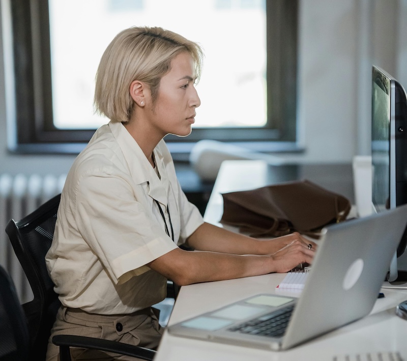 A contractor reviewing company documents with an accountant